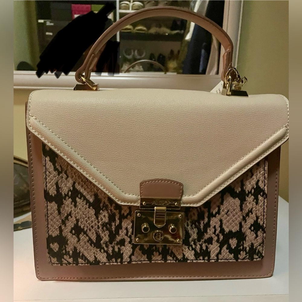 New Aldo Chic Cream & Snake print purse. Comes with matching wallet pink wallet